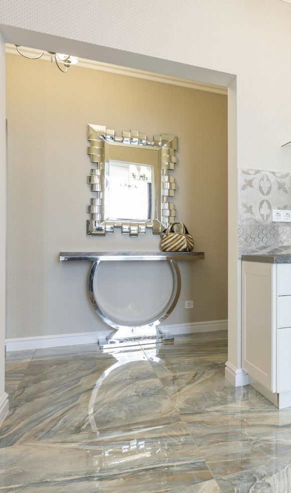 Marble tiled floor in a Swansea house hallway with a polished finish.